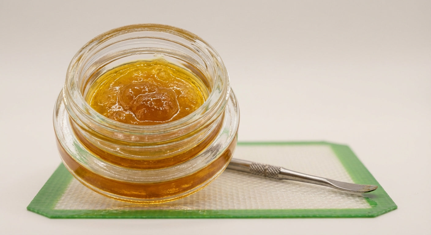 Close-up of a saucy live resin jar sparkling under soft light