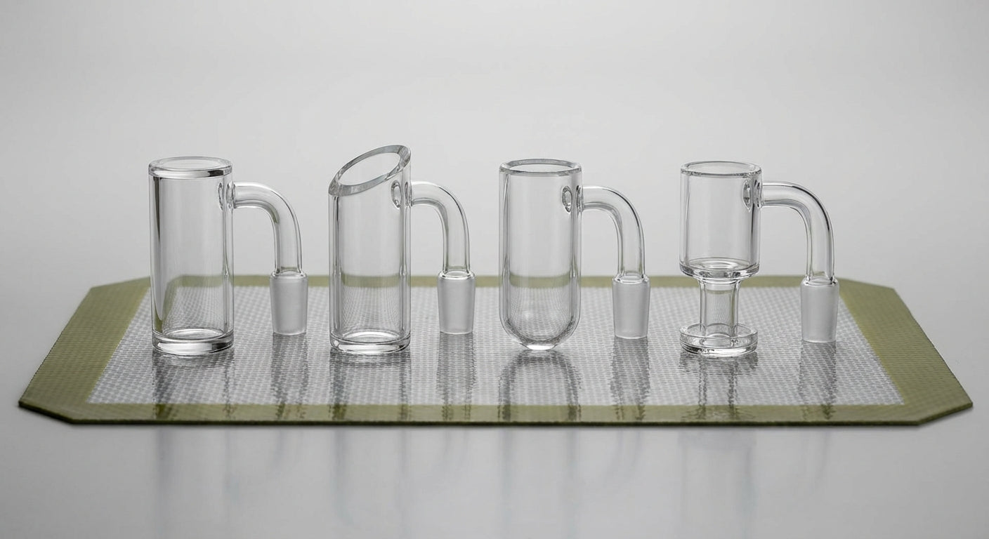 Close-up lineup of different quartz banger shapes on a dab pad