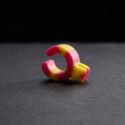 1.25" Silicone Smoke Ring on dark slate surface - Oil Slick Pad