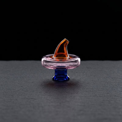 1.5" Color UFO Carb Cap on dark slate surface - Oil Slick Pad