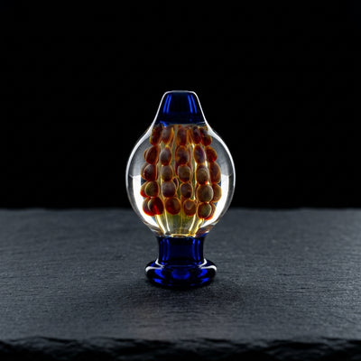 1.5" Fume Dot Implosion Carb Cap on dark slate surface - Oil Slick Pad