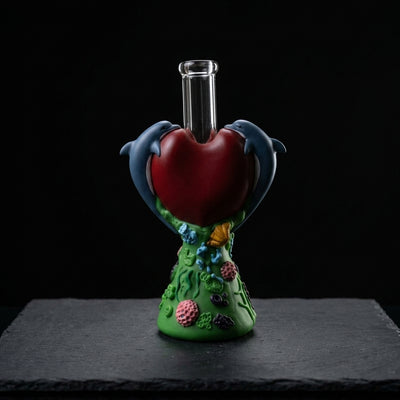 10.4" Dolphin water pipe on dark slate surface - Oil Slick Pad