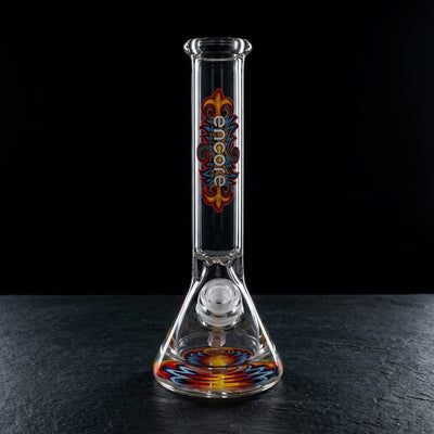 10" Encore Pounder w/ Reversal Decal Beaker on dark slate surface - Oil Slick Pad