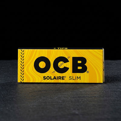 OCB Solaire Slim Papers + Tips — Oil Slick editorial product photo