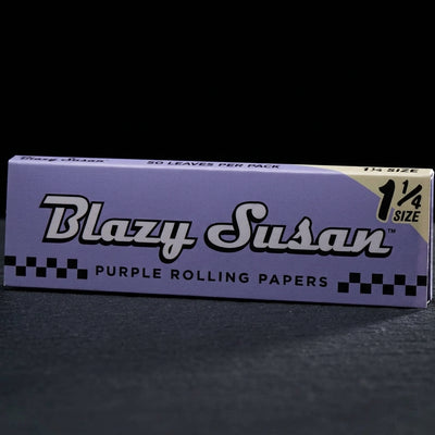 Blazy Susan Purple Rolling Papers – 1 ¼ — Oil Slick editorial product photo