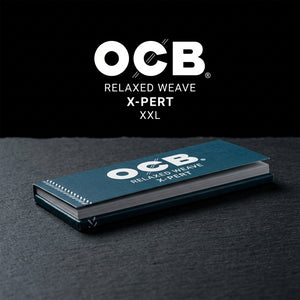 OCB X-Pert XXL Rolling Papers — Oil Slick editorial product photo