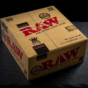 RAW Classic King Size Slim Rolling Papers 50bx — Oil Slick editorial product photo