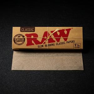 RAW Classic 1 ¼ Rolling Papers — Oil Slick editorial product photo