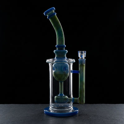 11" Monark Color Fume Taurus Bong on dark slate surface - Oil Slick Pad