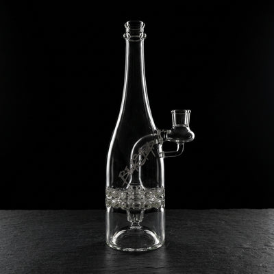 12'' Black Sheep 75mm Clear Ratchet Wine Bottle on dark slate surface - Oil Slick Pad