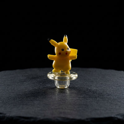 2" - 2.5" Pikachu Solid Carb Cap on dark slate surface - Oil Slick Pad