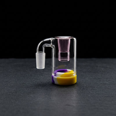 2.5" 14 M 90° Glass Reclaim Catcher w/ Color Downstem on dark slate surface - Oil Slick Pad