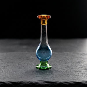 2.5″ FULL COLOR LONG BUBBLE CARB CAP on dark slate surface - Oil Slick Pad