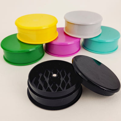 2.5" Three Piece Plastic Magnetic Grinder, light background