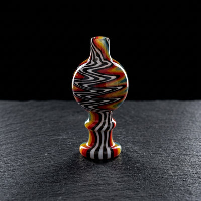 2.5" Wigwag Maria Top Ball Carb Cap on dark slate surface - Oil Slick Pad