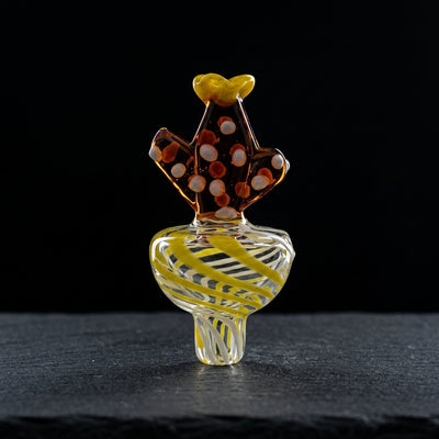 2" Cactus Orb Carb Cap on dark slate surface - Oil Slick Pad
