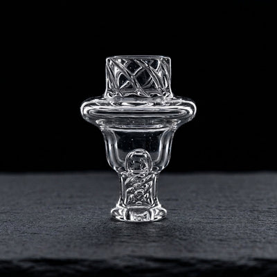 2″ Clear Spinner Carb Cap on dark slate surface - Oil Slick Pad