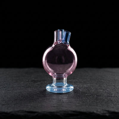 2″ Color Orb Triple Airflow Carb Cap on dark slate surface - Oil Slick Pad