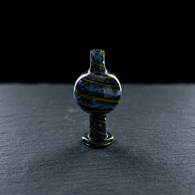 2" Dichro Spiral Bubble Carb Cap on dark slate surface - Oil Slick Pad