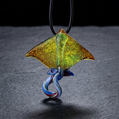 2" Peaselburg Dichro Stingray Pendant on dark slate surface - Oil Slick Pad