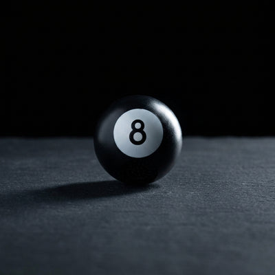 2" Plastic 8 Ball Grinder on dark slate surface - Oil Slick Pad