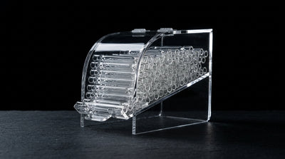 3.5″ OG Chillum 100 Pack w/ Display on dark slate surface - Oil Slick Pad