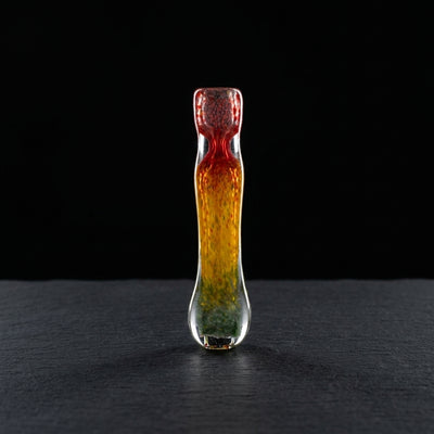3.5" Rasta Frit Chillum on dark slate surface - Oil Slick Pad