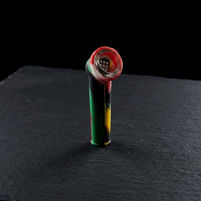 3.5″ Silicone Hand Pipe w/ Glass Flower Bowl on dark slate surface - Oil Slick Pad