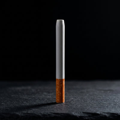 3'' Ceramic Cigarette Chillum - 1 on dark slate surface - Oil Slick Pad