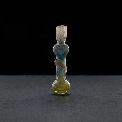 3.5″ Frit Larvae Attached Chillum on dark slate surface - Oil Slick Pad