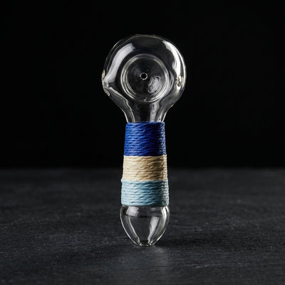 4.5" Hemp Wrapped Clear Hand Pipe on dark slate surface - Oil Slick Pad