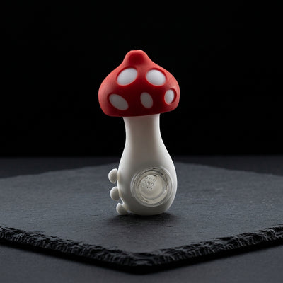4.5″ Silicone Mushroom Pipe on dark slate surface - Oil Slick Pad