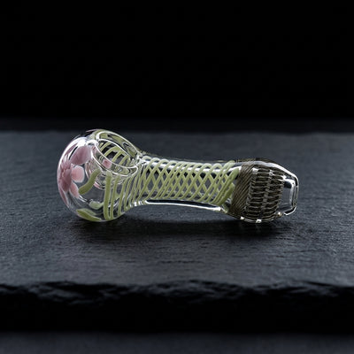 4" Color Spiral Glass Hand Pipe on dark slate surface - Oil Slick Pad