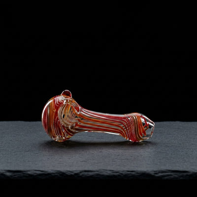 4" Color Swirl Twist Head & Mouth Hand Pipe on dark slate surface - Oil Slick Pad