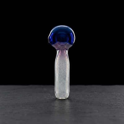 4" Multicolor Glass Hand Pipe on dark slate surface - Oil Slick Pad
