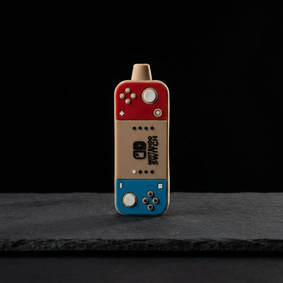 4'' Silicone Game Controller Pipe on dark slate surface - Oil Slick Pad