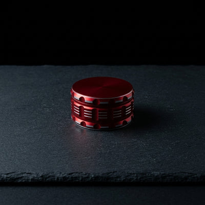 4″ XL Grinder on dark slate surface - Oil Slick Pad