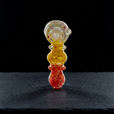 4" Yellow, Red, & White Frit Maria Orb Body Hand Pipe on dark slate surface - Oil Slick Pad