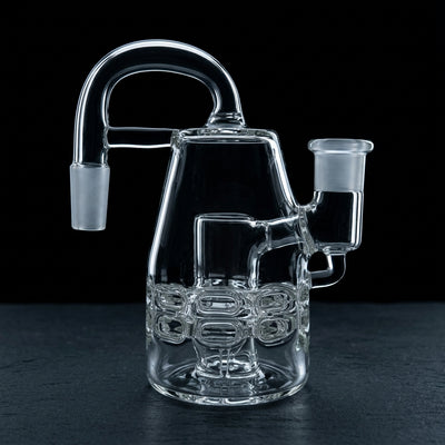 5″ 14 M 90° Black Sheep Large Clear Ratchet Ash Catcher on dark slate surface - Oil Slick Pad