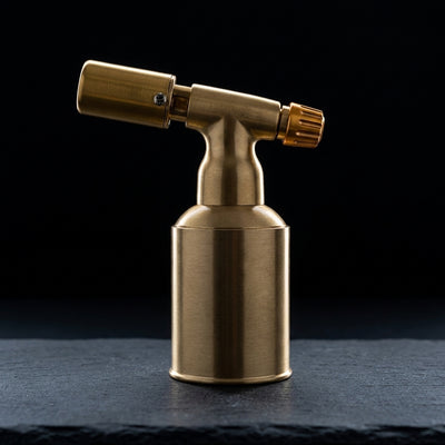 5" aLeaf Brass Blow Torch on dark slate surface - Oil Slick Pad