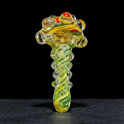 5" Fume Color Line Body w/ Dots & Swirl Rasta Head Hand Pipe on dark slate surface - Oil Slick Pad
