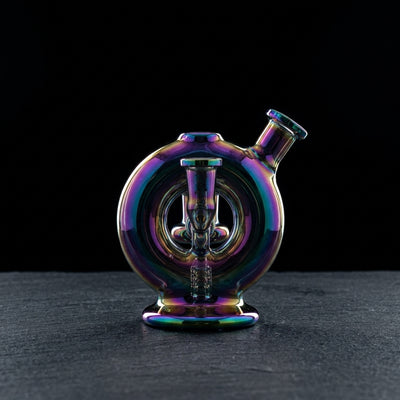 5" Iridescent Donut Rig (one off) on dark slate surface - Oil Slick Pad