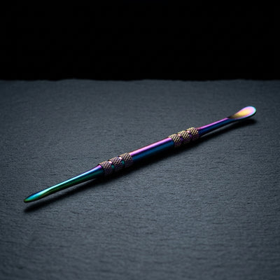 5″ Iridescent Stainless Steel DAB Tool on dark slate surface - Oil Slick Pad