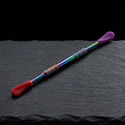 5" Iridescent Stainless Steel Dab Tool w/ Silicone Tips on dark slate surface - Oil Slick Pad