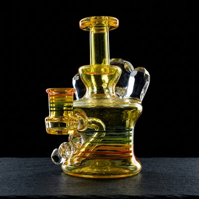 5" PHD Glass Full CFL Facet Opal Rip Curl Bottle on dark slate surface - Oil Slick Pad