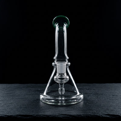 6.5" Encore Maria Neck Bell Rig on dark slate surface - Oil Slick Pad