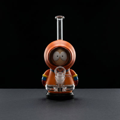 6.5'' Orange Parka Kid Water Pipe on dark slate surface - Oil Slick Pad