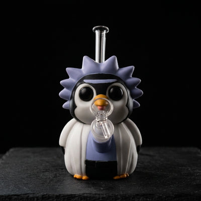 6.6" Penguin Scientist Water Pipe on dark slate surface - Oil Slick Pad