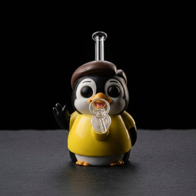 6.8" Penguin Politician Water Pipe on dark slate surface - Oil Slick Pad