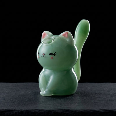 6″ Color Sculpted Cat Rig on dark slate surface - Oil Slick Pad